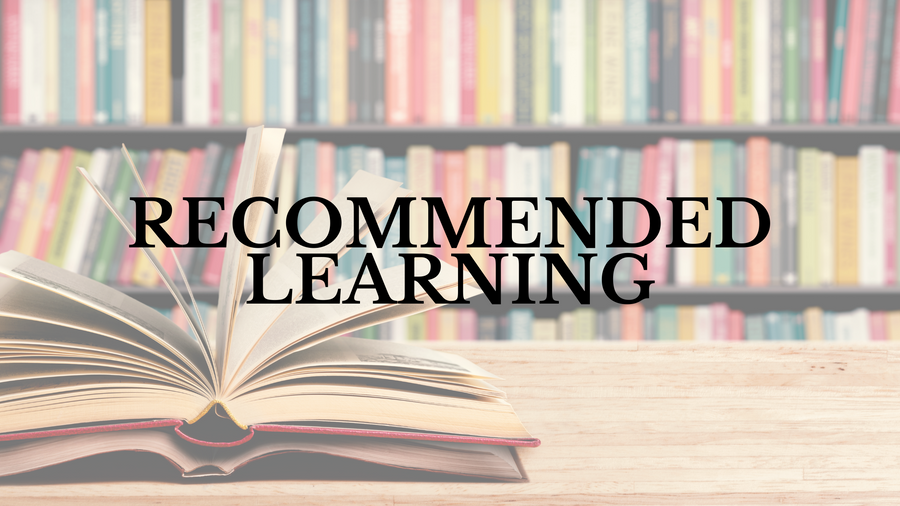 Open book in front of bookshelves – Recommended Learning